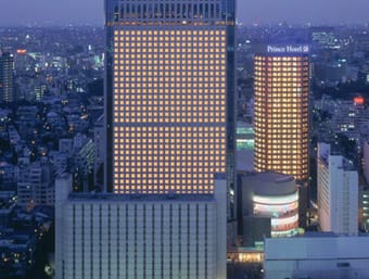 a view of a city at night from the top of a building.